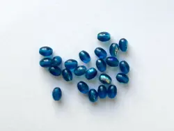 Mačkané skleněné korálky oliva (ovál) 8 × 6 mm, 23 ks Modrá  AB pokov
