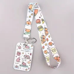 Šňůrka na krk s karabinou a poutkem, pouzdro na kartu kapybary 