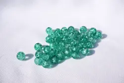 Korálek práskaný kulička 8mm světle  zelená