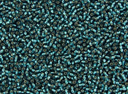 Rokajlové korálky Toho  - Round 15/0 : Silver-Lined Teal TR-15-27BD