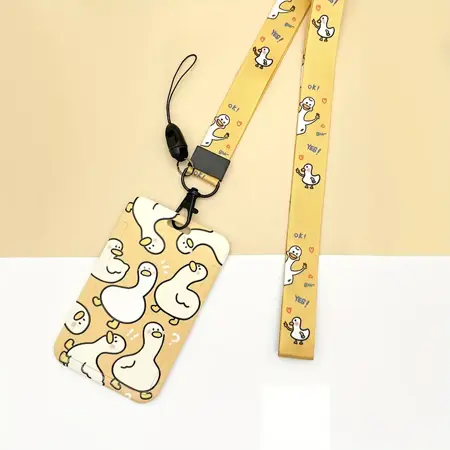 Šňůrka na krk s karabinou a poutkem, pouzdro na kartu Kachny