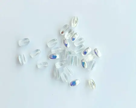 Korálek mačkaný ZRNKO 9/5mm crystal AB