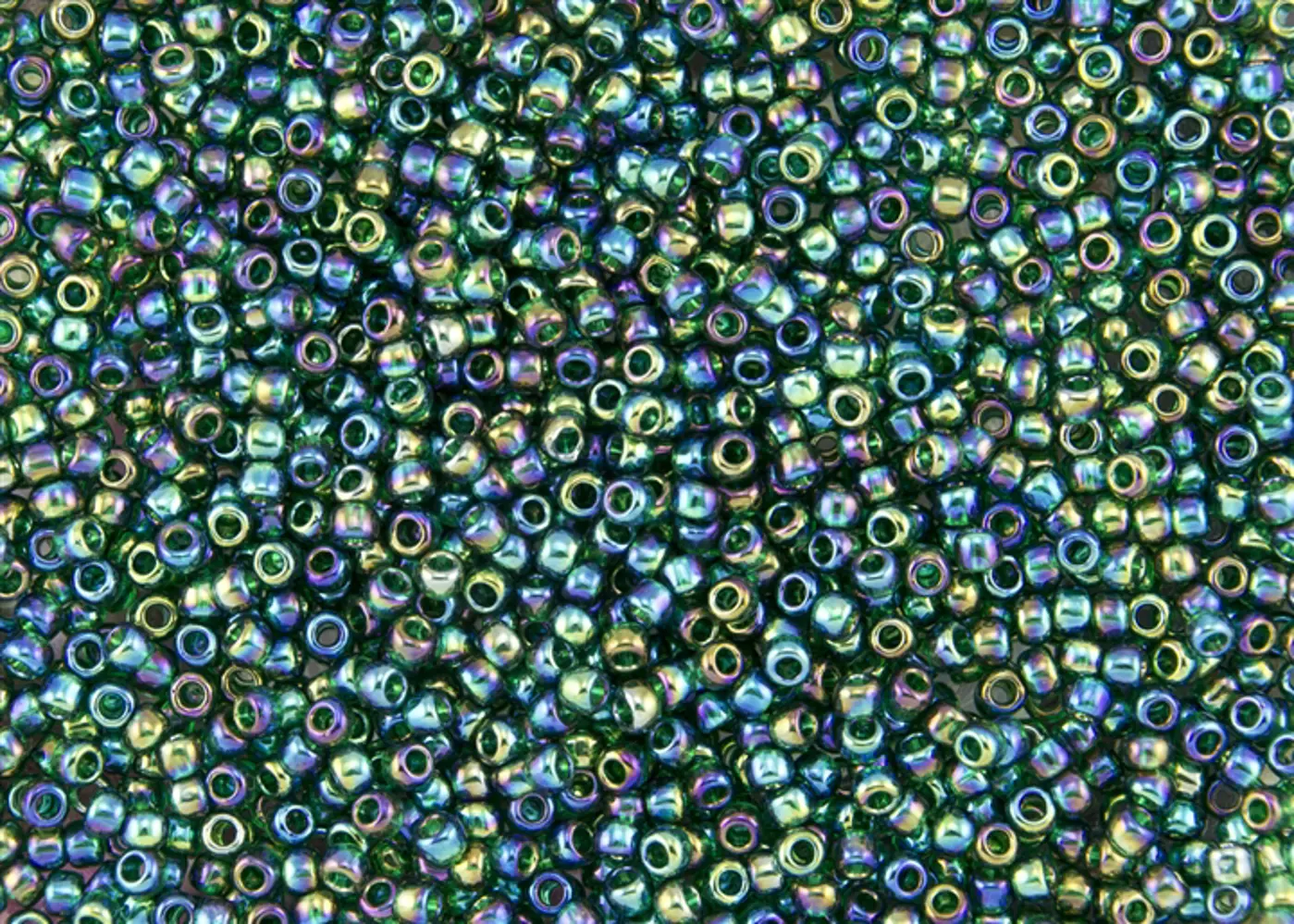 Rokajlové korálky - Round 11/0 : Transparent-Rainbow Green Emerald TR-11-179 - fotografie 1