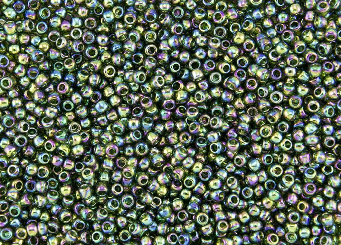 Rokajlové korálky Toho  - Round 15/0 : Transparent-Rainbow Olivine TR-15-180 - fotografie 1
