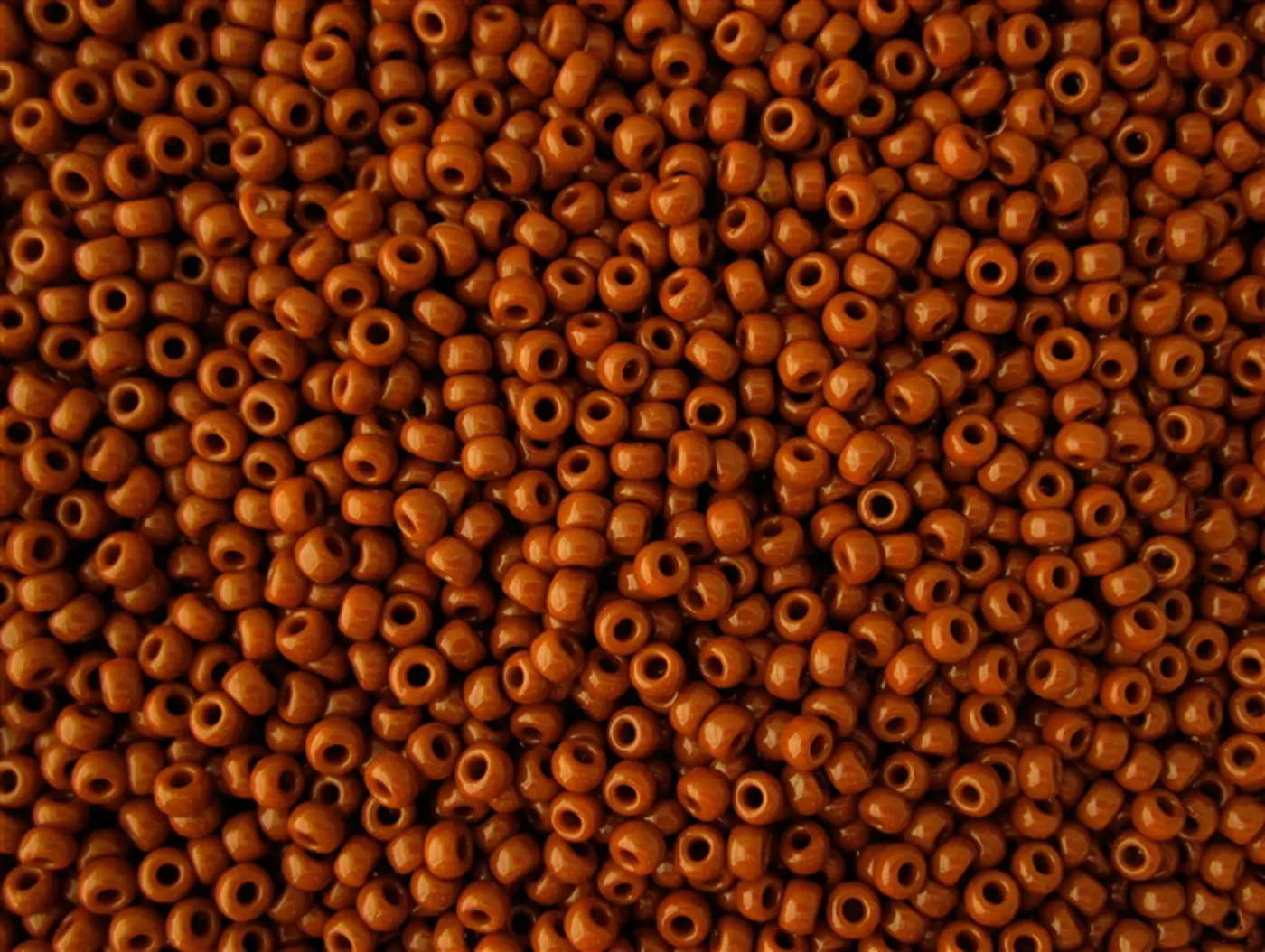 Rokajlové korálky Toho  - Round 15/0 : Opaque Terra Cotta TR-15-46L - fotografie 1