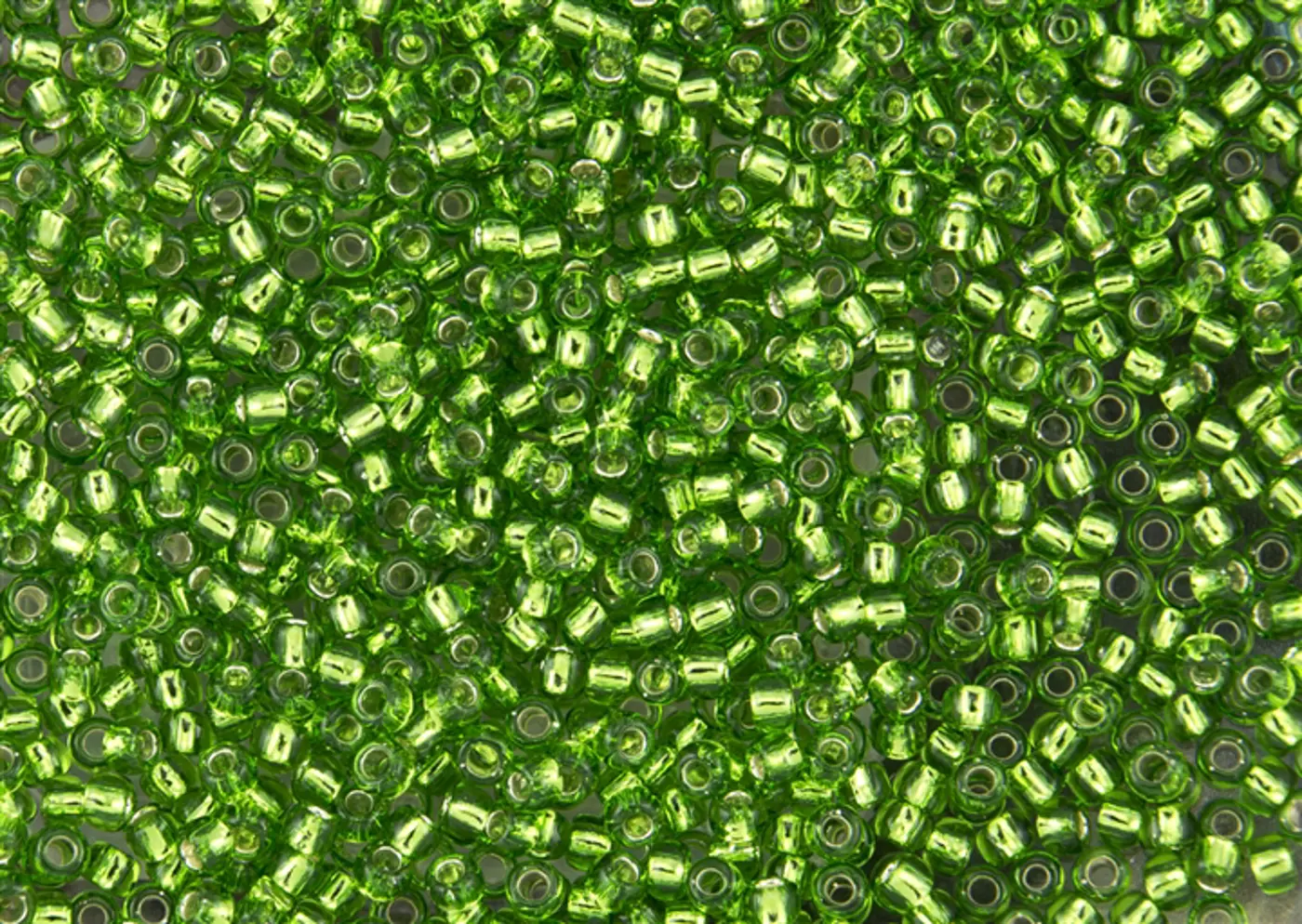 Rokajlové korálky - Round 11/0 :  Silver-Lined Peridot TR-11-27 - fotografie 1
