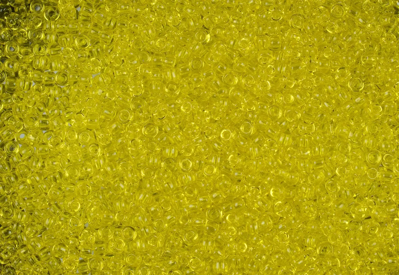 Rokajlové korálky - Round 11/0 : Transparent Lemon TR-11-12 - fotografie 1