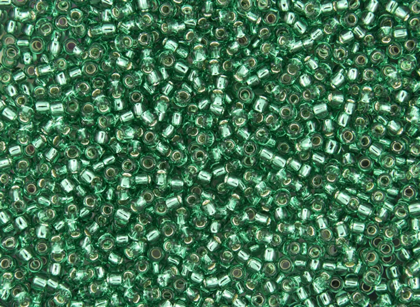 Rokajlové korálky Toho  - Round 15/0 : Silver-Lined Dk Peridot TR-15-24B - fotografie 1