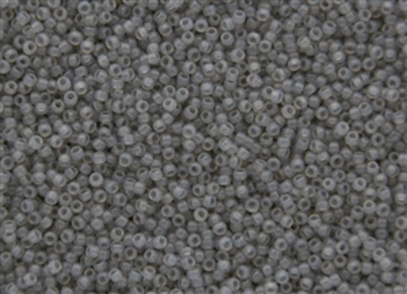 Rokajlové korálky Toho  - Round 15/0 : Translucent Gray TR-15-1150 - fotografie 1