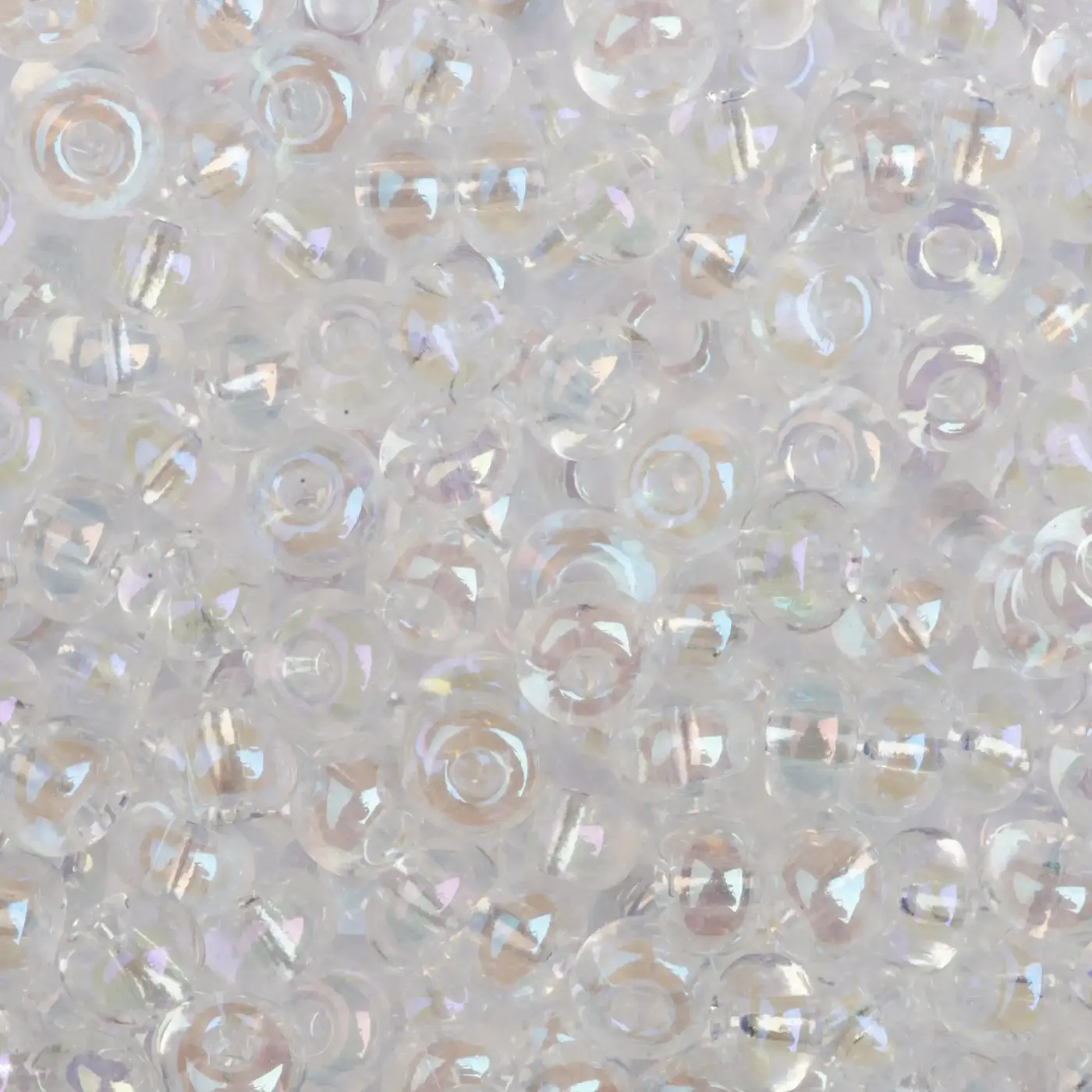 PRECIOSA rokajl 6/0, 3,7 mm, 10 g  čiré s listrem (58205 ) - fotografie 1