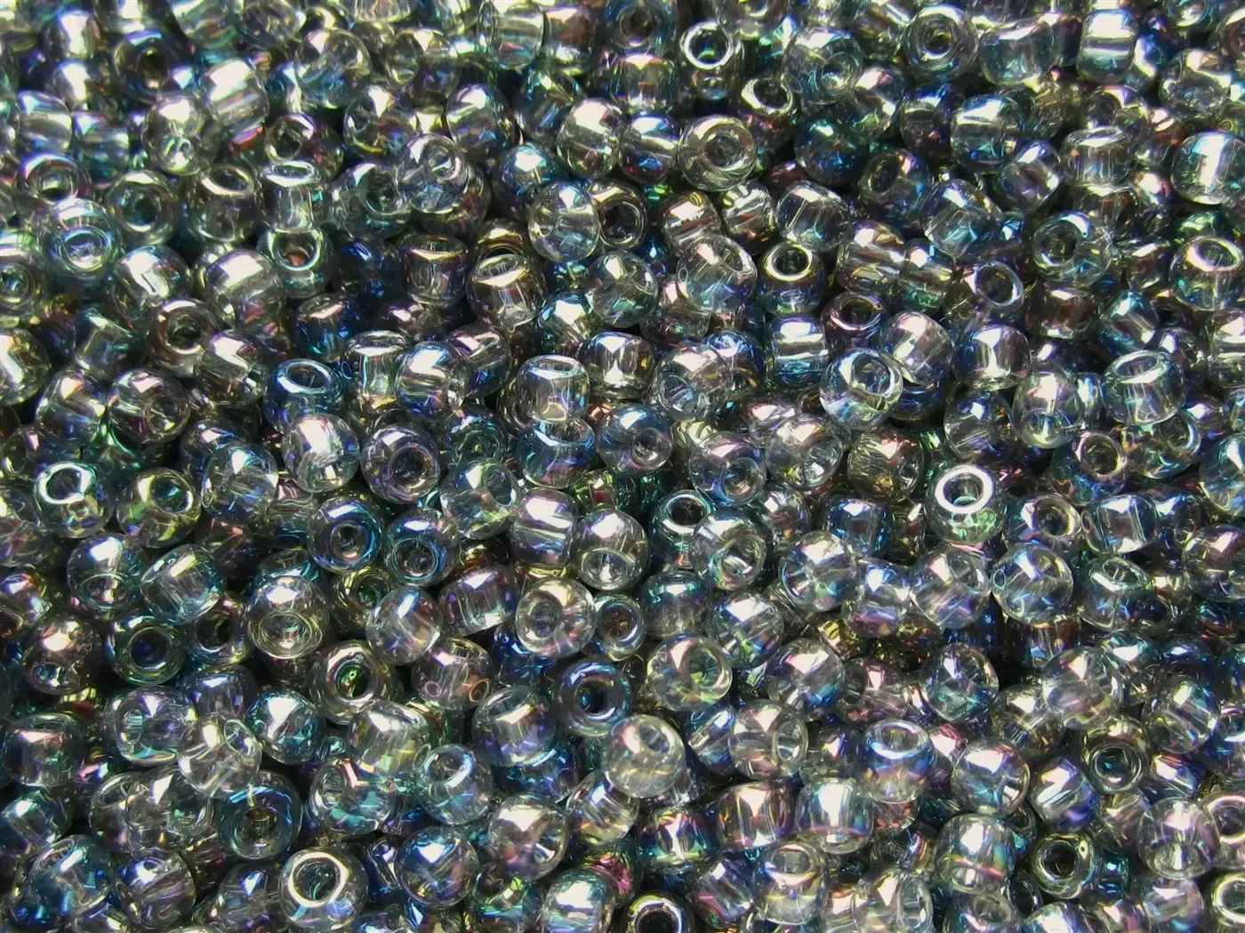 Rokajlové korálky Toho  - Round 15/0 : Transparent-Rainbow Black Diamond TR-15-176 - fotografie 1