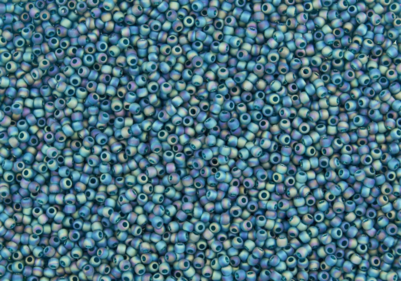 Rokajlové korálky Toho  - Round 15/0 : Transparent-Rainbow-Frosted Teal TR-15-167BDF - fotografie 1
